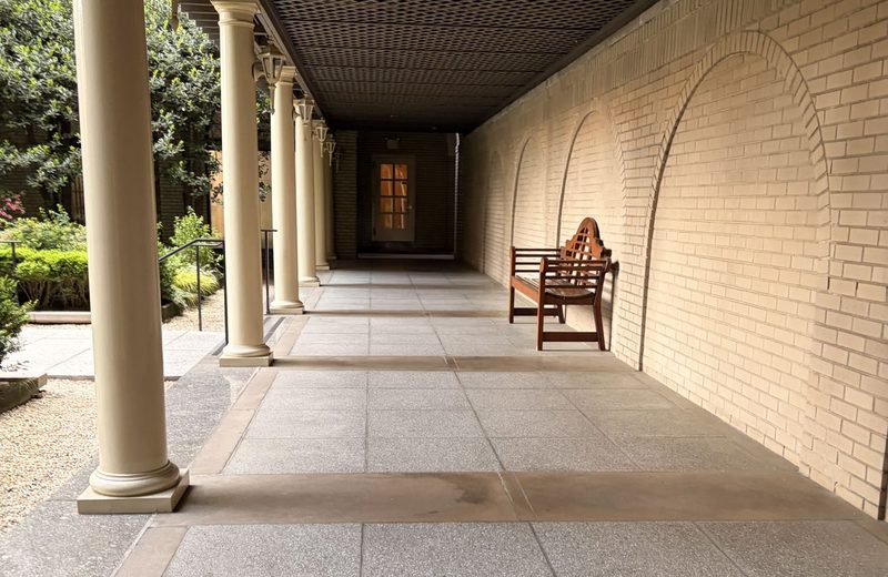 The colonnade running along the garden