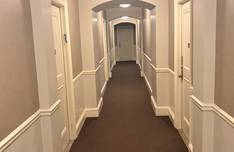 A residential corridor, common areas kept clean and orderly