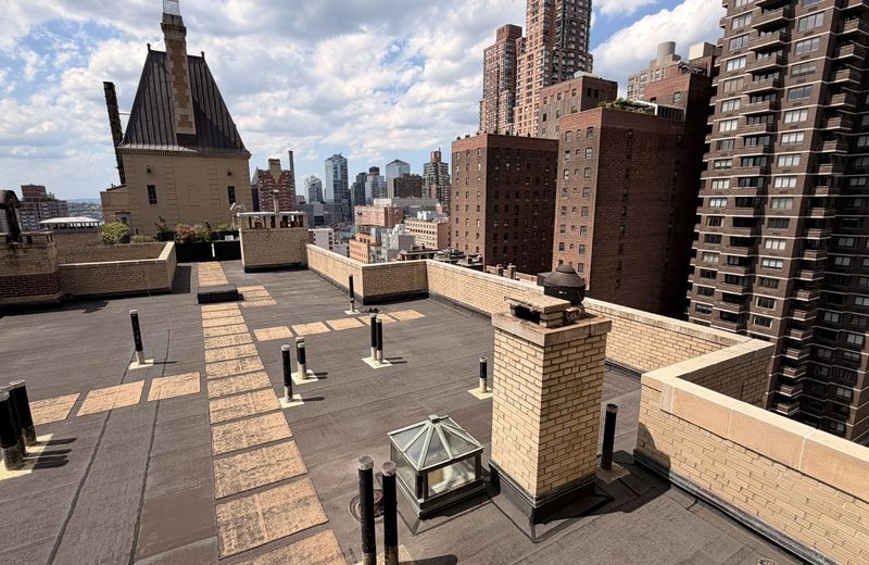 Roof level, drains checked clear of debris