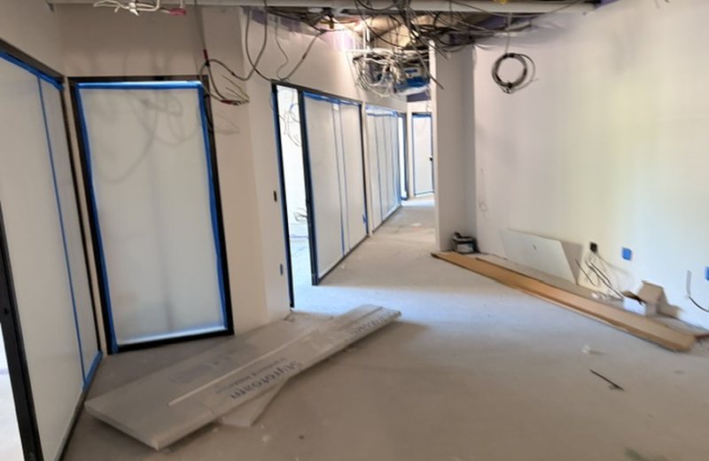 Partitions closed in, door frames set and protected